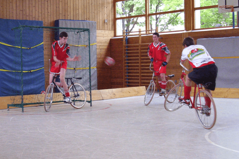 men playing cycle-ball