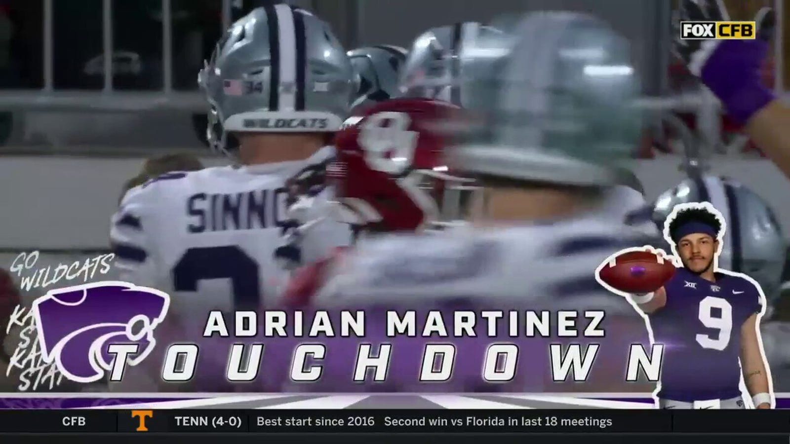 Adrian Martinez fakes the handoff and runs for a TD